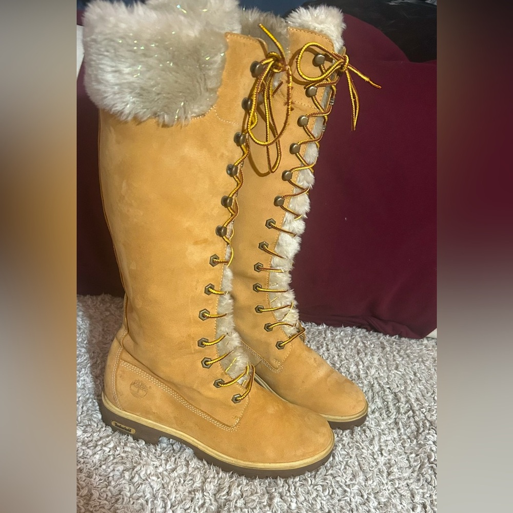 Woman’s Timberland 16inch tall,wheat leather,faux fur winter boots.size 7.5